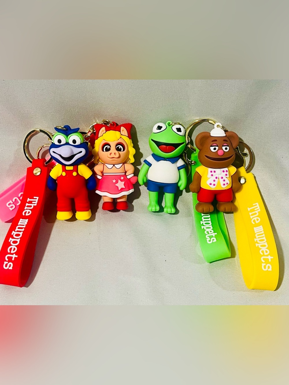 Muppets Colorful Character Keychain Set - Green, Red, Yellow, Pink - 4 Pack